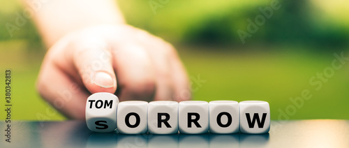Tela Hand turns dice and changes the word sorrow to tomorrow