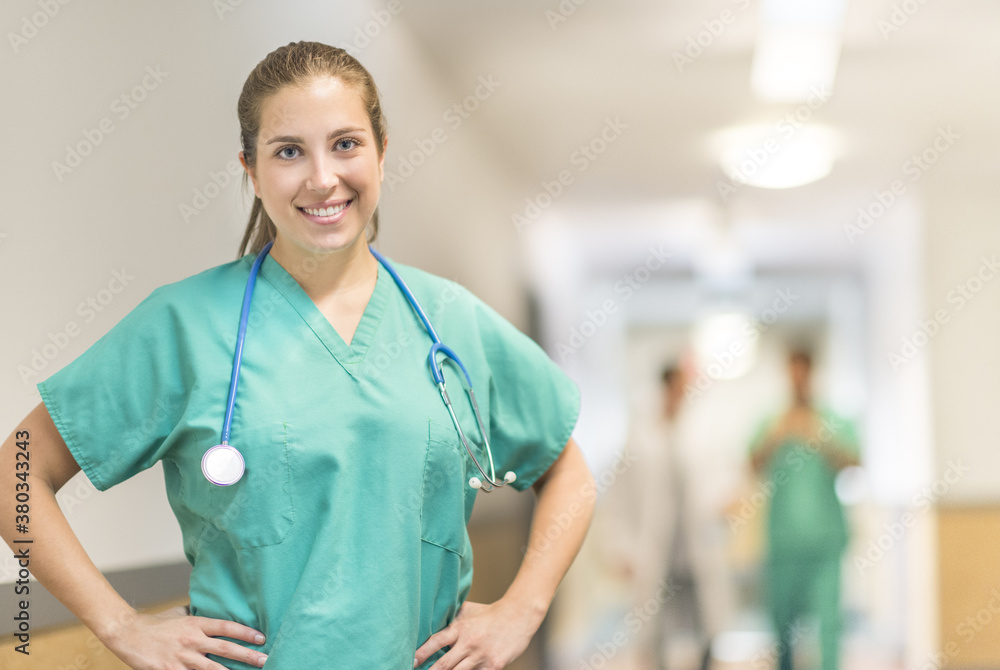 Portrait of female doctor in hospital hallway Portrait of female doctor in hospital hallway
