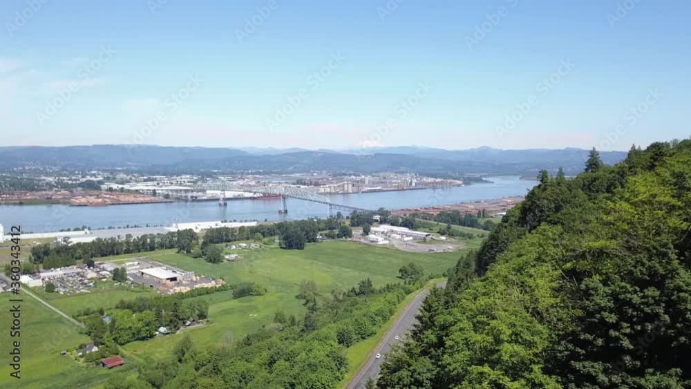 Aerial of Longview, Washington and the Lewis and Clark bridge crossing the Columbia River connecting the towns of Rainier, Oregon and Longview, Washington. Aerial of Longview, Washington and the Lewis and Clark bridge crossing the Columbia River connecting the towns of Rainier, Oregon and Longview, Washington.