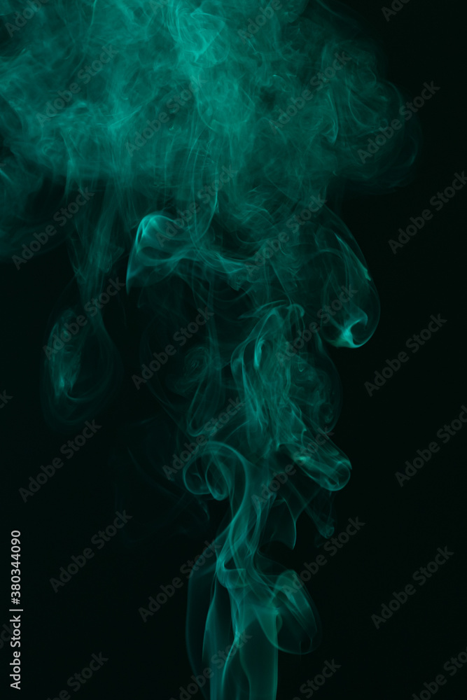 Fototapeta premium Turquoise smoke on black