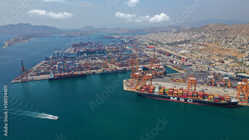 Aerial drone photo of industrial cargo container logistics terminal of Perama near commercial port of Piraeus © aerial-drone