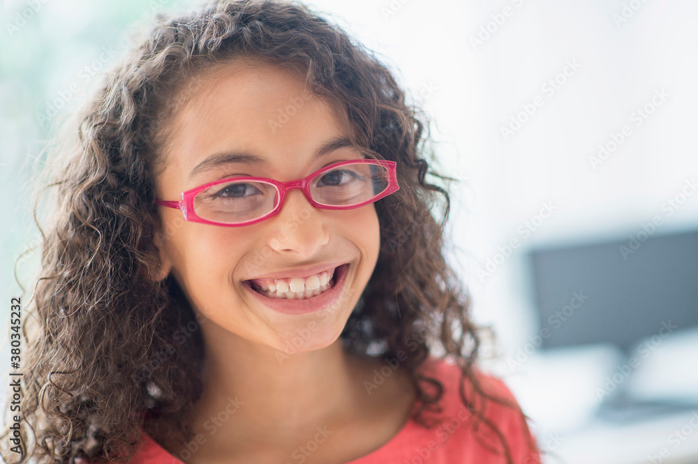 Portrait of schoolgirl (8-9) wearing pink eyeglasses Portrait of schoolgirl (8-9) wearing pink eyeglasses