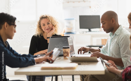 Wallpaper Mural Portrait of businesswoman during meeting in office Torontodigital.ca