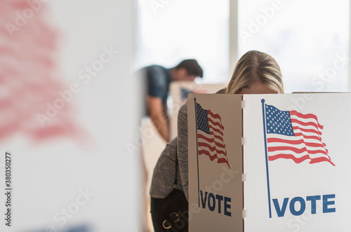 Woman voting on election day photo