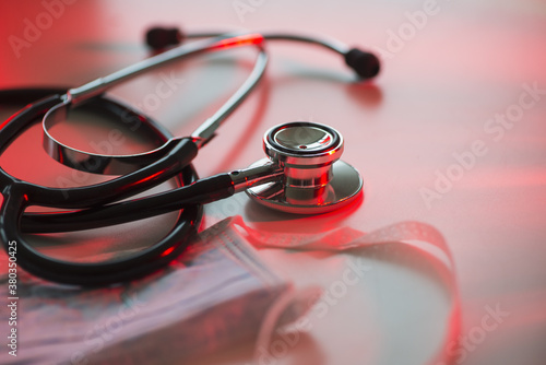 Close up of stethoscope and surgical mask, studio shot