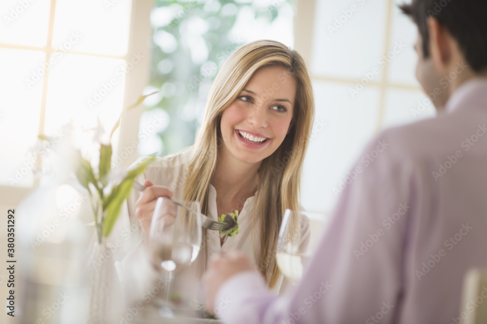 Couple eating dinner in restaurant Couple eating dinner in restaurant