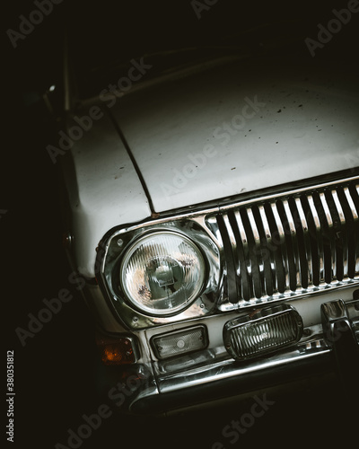 Front headlight of an old retro car from soviet russia