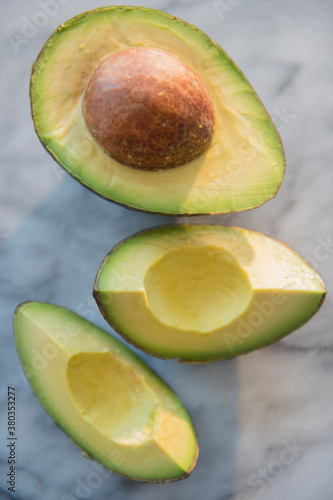 Studio shot of avocado slices photo