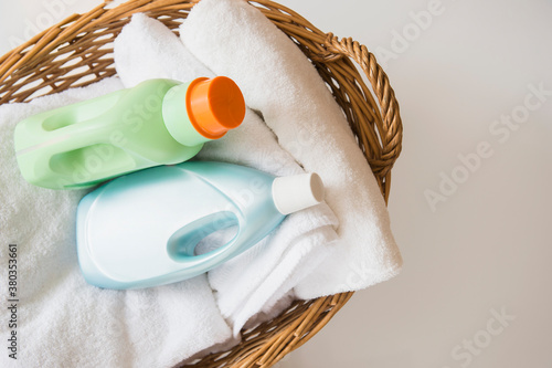 Basket with laundry and detergents