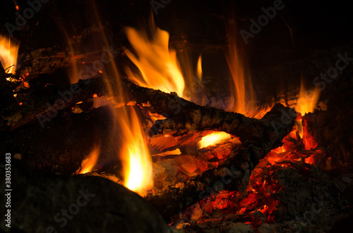 embers burn down in a hardwood fire