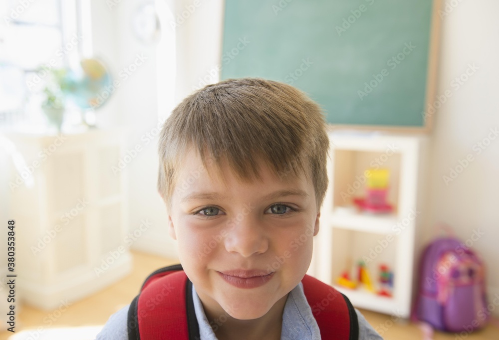 Portrait of boy (6-7) in classroom Portrait of boy (6-7) in classroom