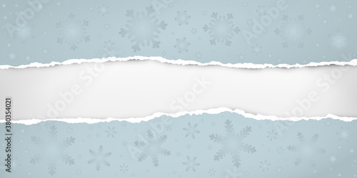 Piece of torn, ripped blue paper with snowflakes pattern and soft shadow are on white background for text. Vector illustration