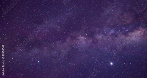 amazing Panorama blue night sky milky way and star on dark background.Universe filled with stars, nebula and galaxy with noise and grain.Photo by long exposure and select white balance.selection focus