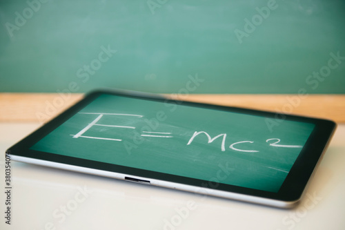 Theory of general relativity displayed on tablet photo