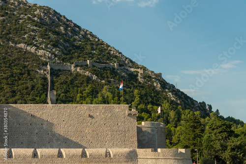 The Walls of Ston town in Peljesac Peninsula, Dalmatia, defensive walls, one of the major touristic attraction in Croatia and the second longest world walls photo