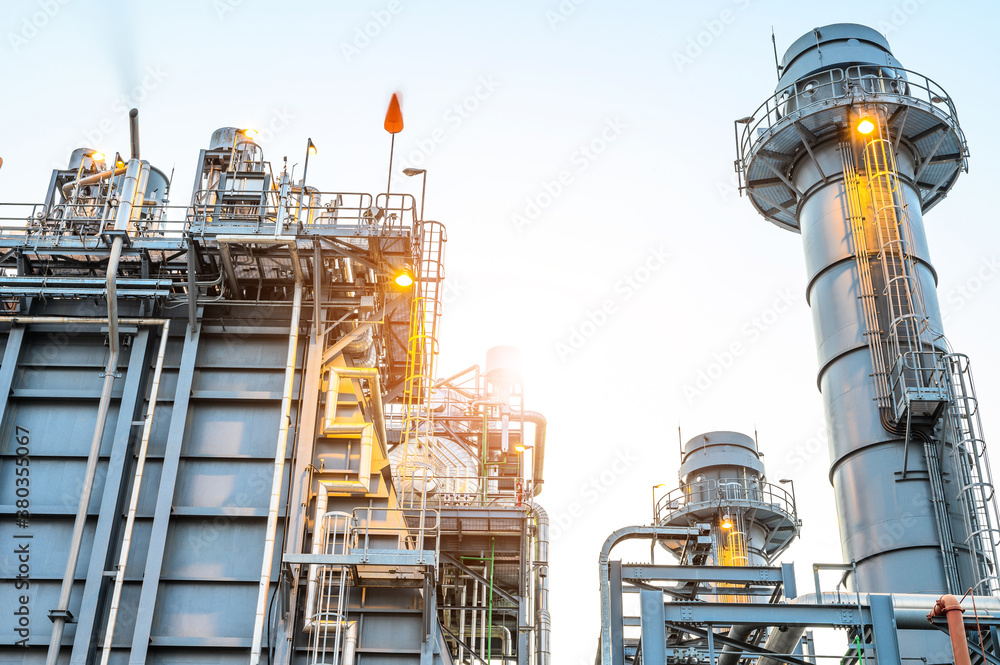 Glow light of petrochemical industry on sunset and Twilight sky ,Power plant,Energy power station area Glow light of petrochemical industry on sunset and Twilight sky ,Power plant,Energy power station area