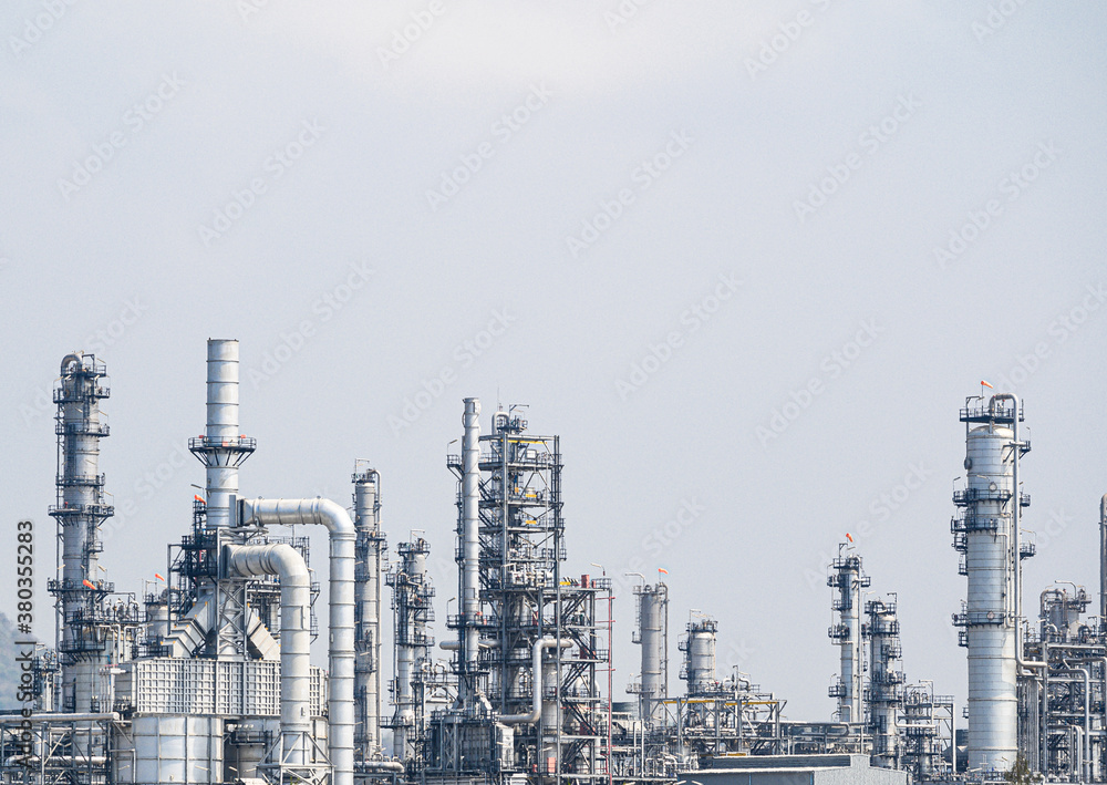 Industrial zone,The equipment of oil refining,Close-up of industrial pipelines of an oil-refinery plant,Detail of oil pipeline with valves in large oil refinery. Industrial zone,The equipment of oil refining,Close-up of industrial pipelines of an oil-refinery plant,Detail of oil pipeline with valves in large oil refinery.