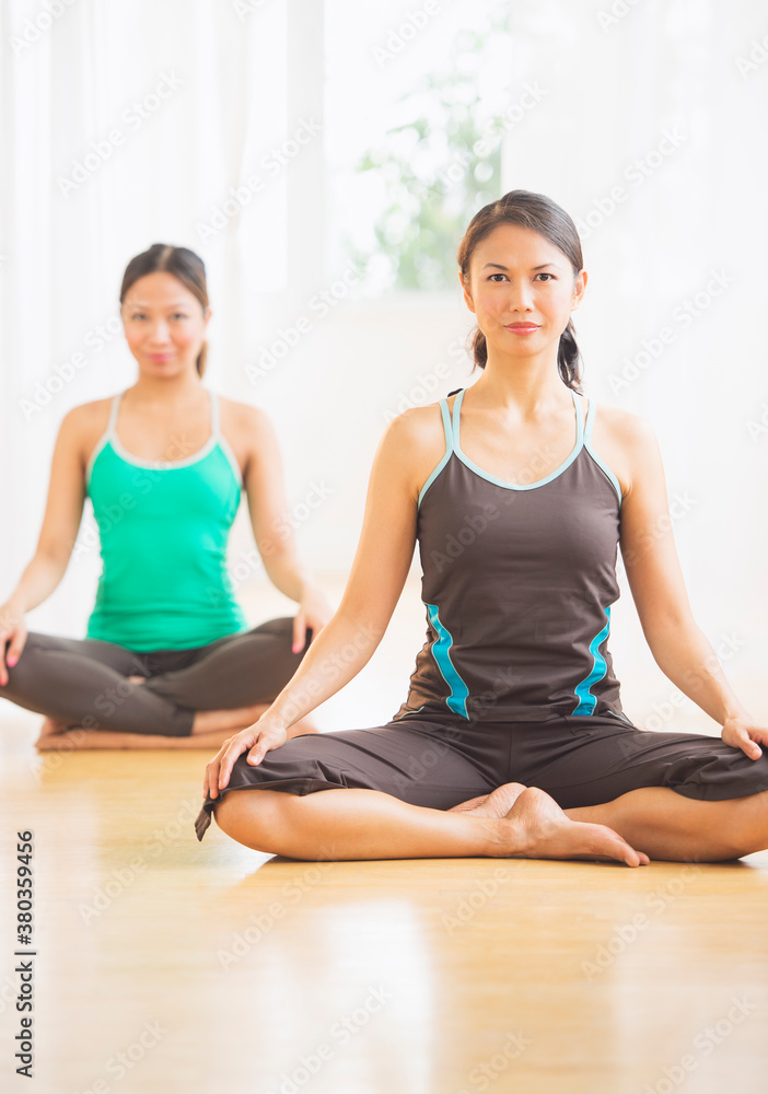 Two women on yoga class Two women on yoga class