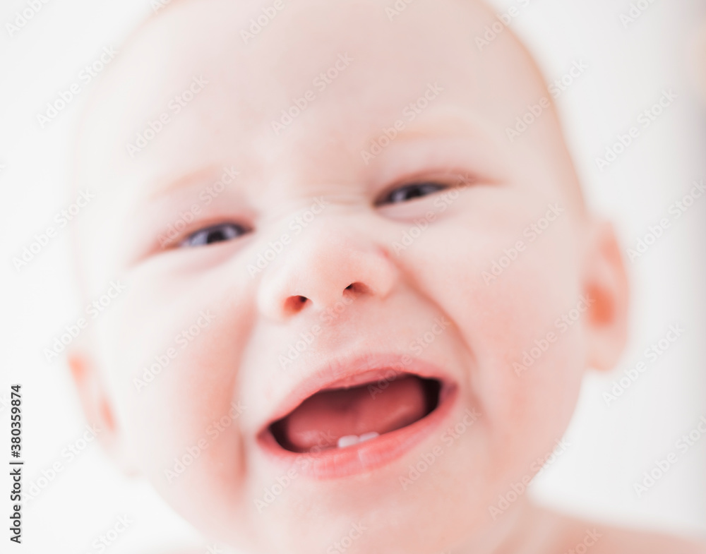 Studio shot portrait of baby boy (18-23 months) with open mouth Studio shot portrait of baby boy (18-23 months) with open mouth