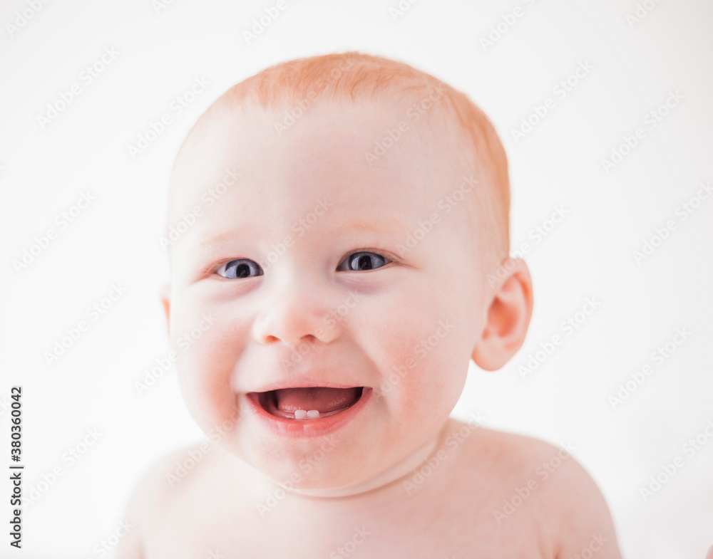 Studio shot portrait of laughing baby boy (18-23 months) Studio shot portrait of laughing baby boy (18-23 months)