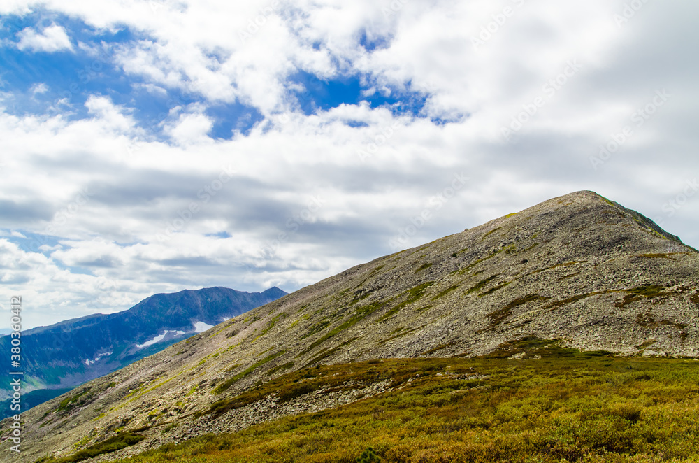 Obraz premium View from high mountain. clouds in the sky
