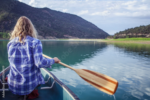 Woman canoeing in lake