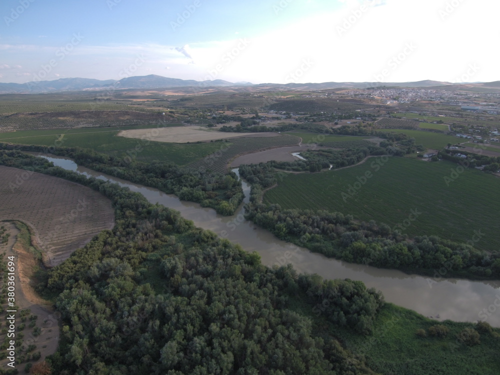 Obraz premium Aerial view of Guadalquivir tributary in Mengibar, Jaén , Spain