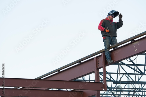 Man welding steel bar photo