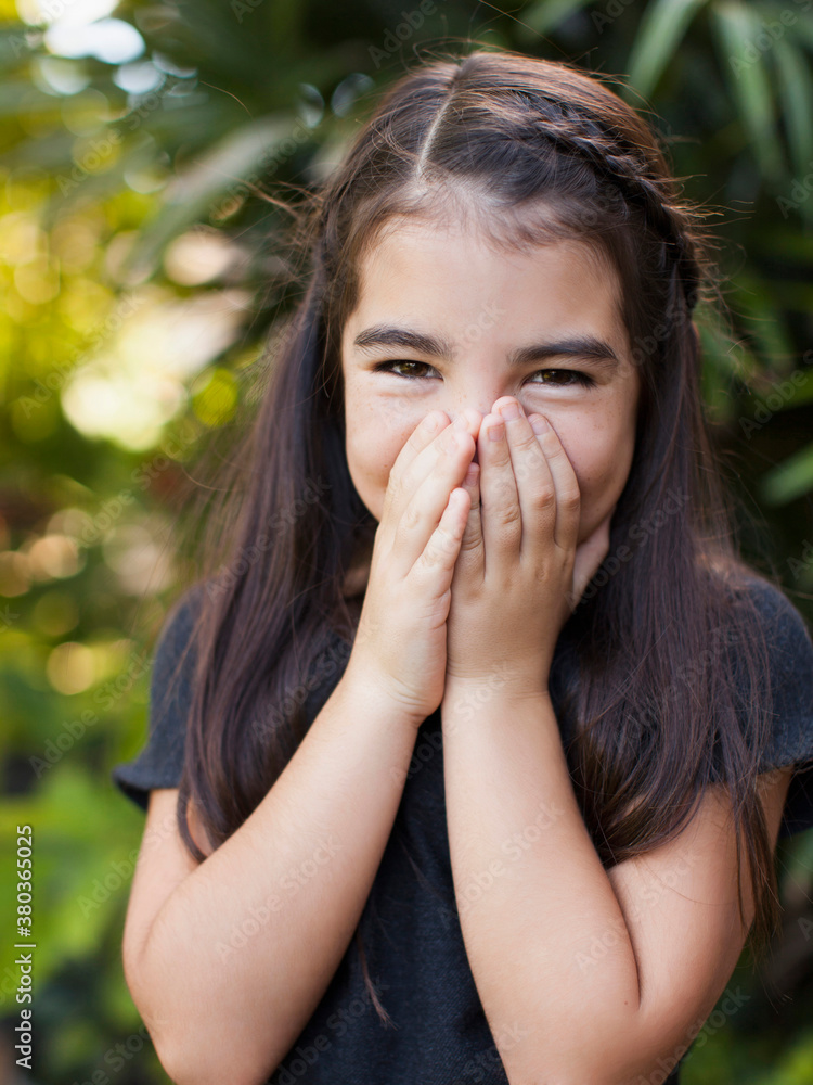 Portrait of girl (8-9) covering mouth Portrait of girl (8-9) covering mouth
