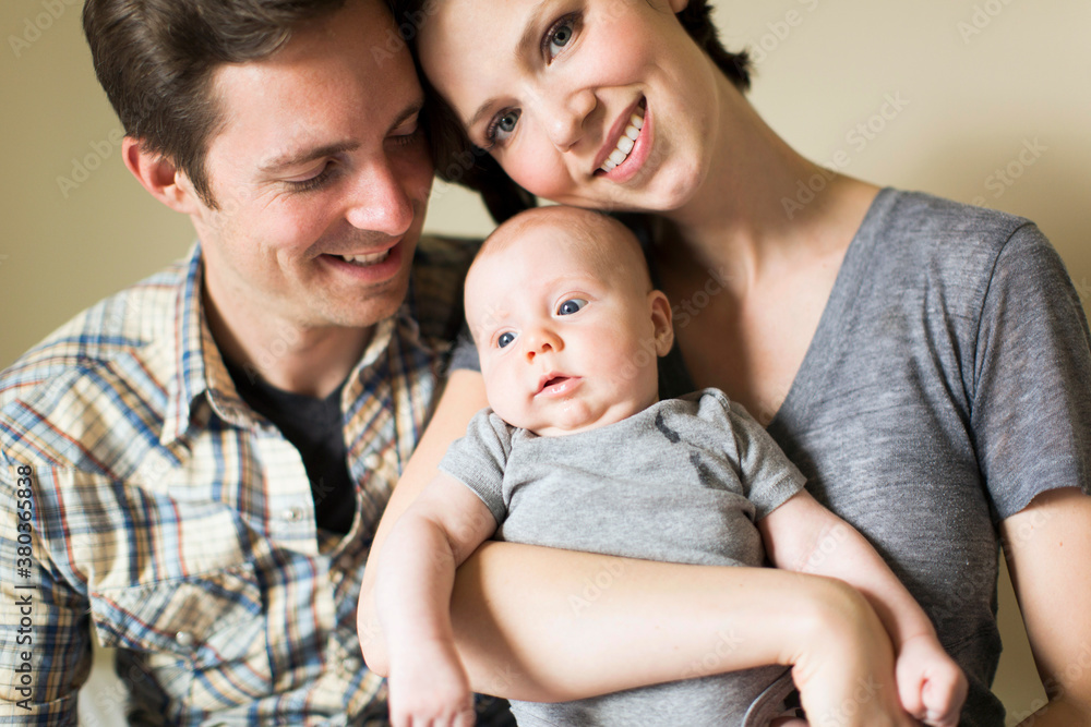 Portrait of parents with baby son (2-5 months) Portrait of parents with baby son (2-5 months)