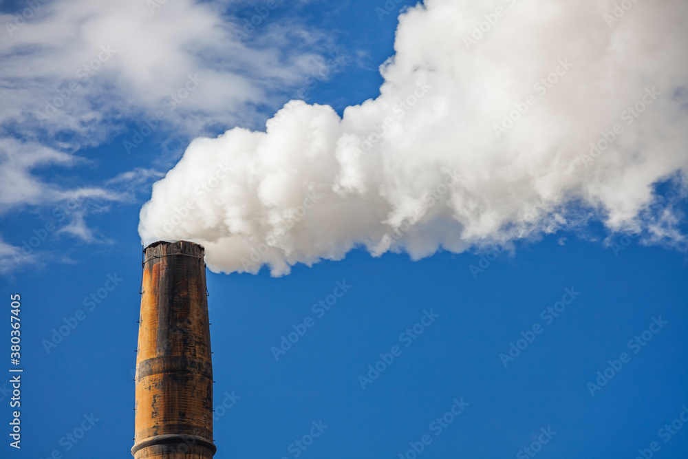 Low angle view of smoke coming out of chimney Low angle view of smoke coming out of chimney