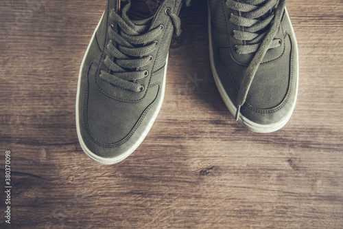 sport shoes on brown background