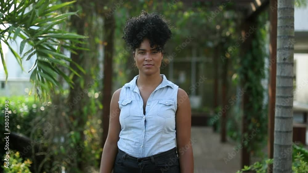 Brazilian young woman standing outside portrait Brazilian young woman standing outside portrait