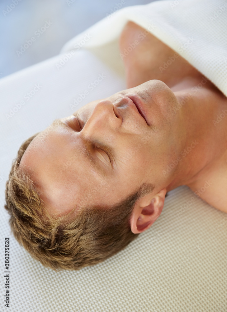 Man ready for a facial spa treatment at spa Man ready for a facial spa treatment at spa