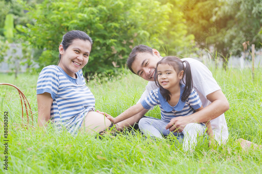 Happy young family spending time at outdoor on a day