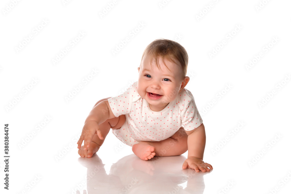 Cute little girl wearing a summer white bodysuit on a white background. Cute little girl wearing a summer white bodysuit on a white background.