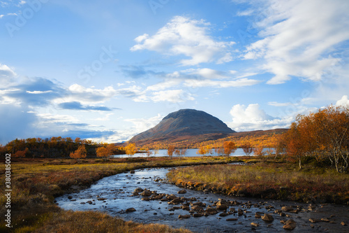 Mountain valley in autumn season. Mountain hill landscape. Kasivarsi Wilderness Area in golden autumn. Lapland. photo