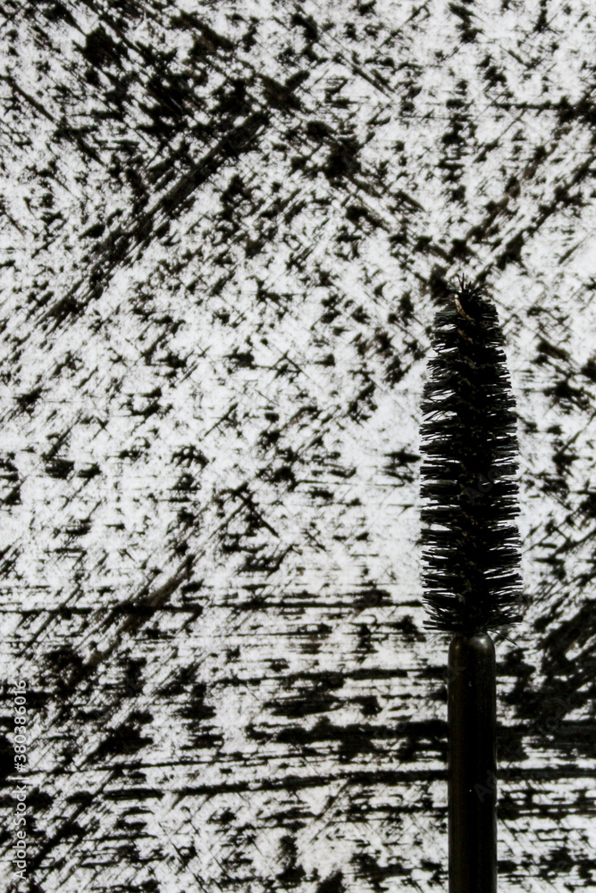 Fototapeta premium mascara brush with black strokes