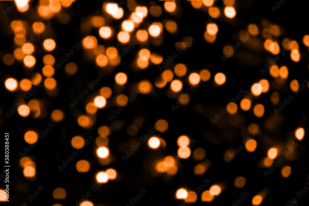 Blurry colored Christmas holiday lights on a black background. Blurry colored Christmas holiday lights on a black background.