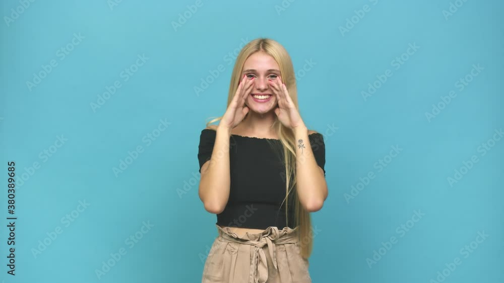Young caucasian blonde woman shouting excited to front Young caucasian blonde woman shouting excited to front