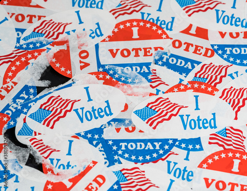 Фотография Concept for the end of the election in the USA with torn and scratched campaign