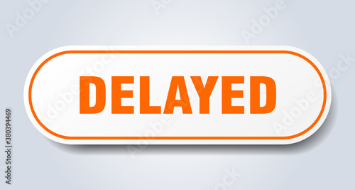 delayed sign. rounded isolated button. white sticker