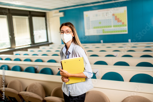 Female student wearing face...