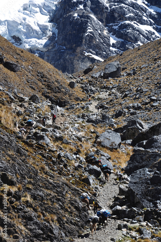 A scenic view of the rocky and mountainous terrain along the Salkantay trek in Peru A scenic view of the rocky and mountainous terrain along the Salkantay trek in Peru
