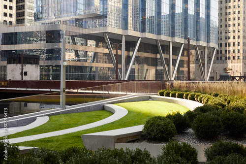 Green and glass environmentally friendly urban architecture for sustainability in city center downtown.