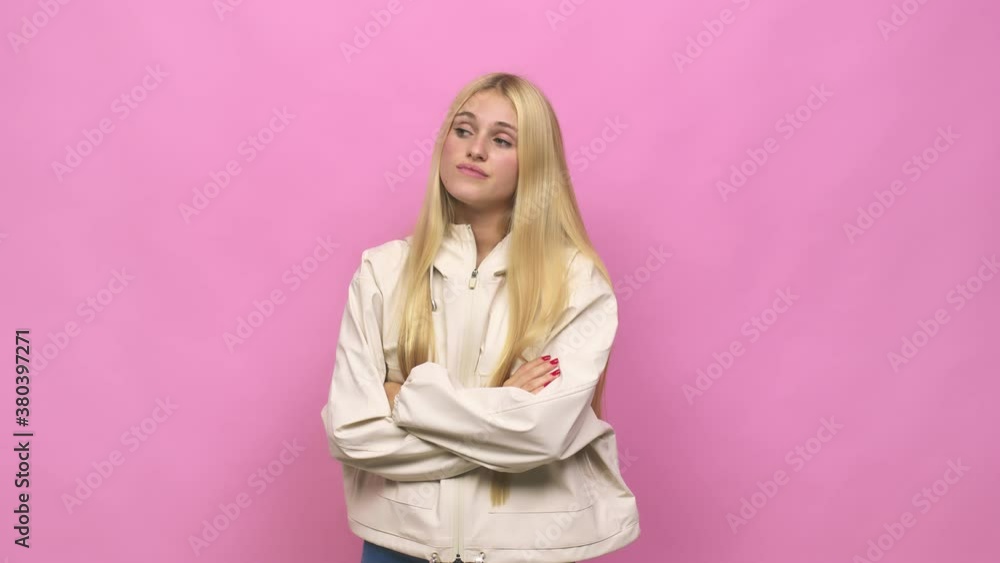 Young caucasian blonde woman tired of a repetitive task Young caucasian blonde woman tired of a repetitive task