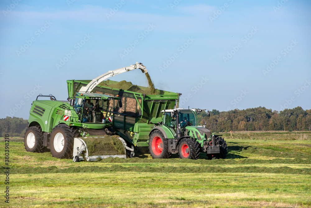 Fototapeta premium Agricultural machinery during haymaking in the field - 3919
