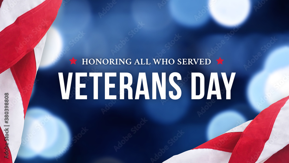 Happy Veterans Day Holiday Celebration Text with Blue Blurred Bokeh