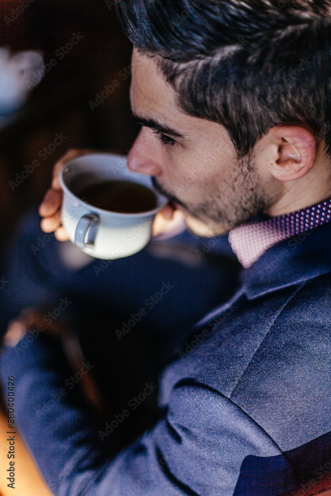 Young Businessman Drinking Coffee Young Businessman Drinking Coffee