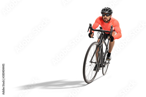 Fototapeta Naklejka Na Ścianę i Meble -  Wide angle side shot of a professional cyclist riding a road bicycle